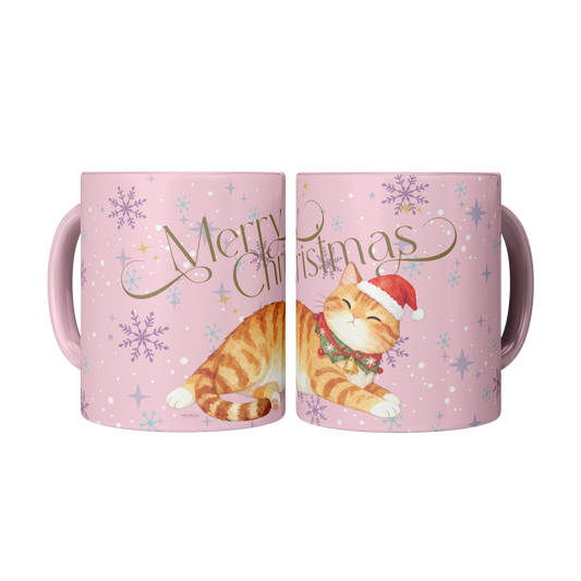 Christmas Cat Mug featuring a cheerful cat in a Santa hat on a pink background with festive snowflakes.
